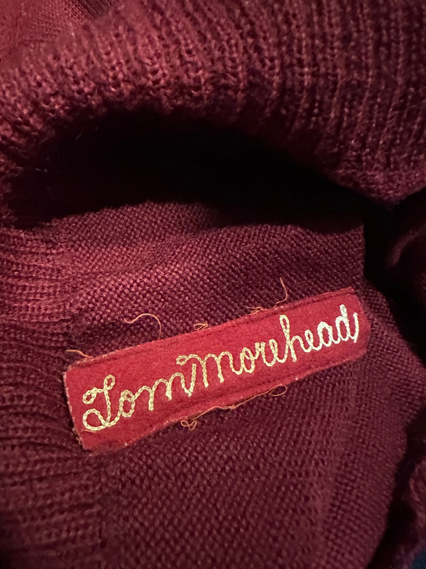 Name embroidered inner sweater.