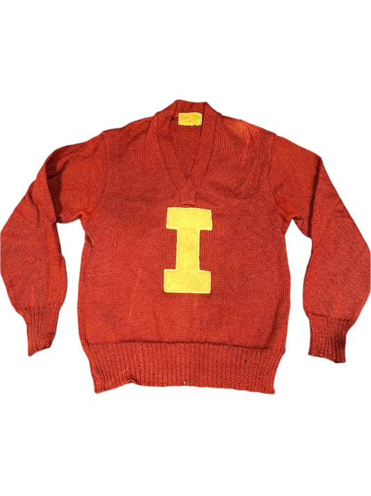 Vintage red sweater with a yellow 'I' on the front, and small yellow text that reads 'Jon Morehead'.