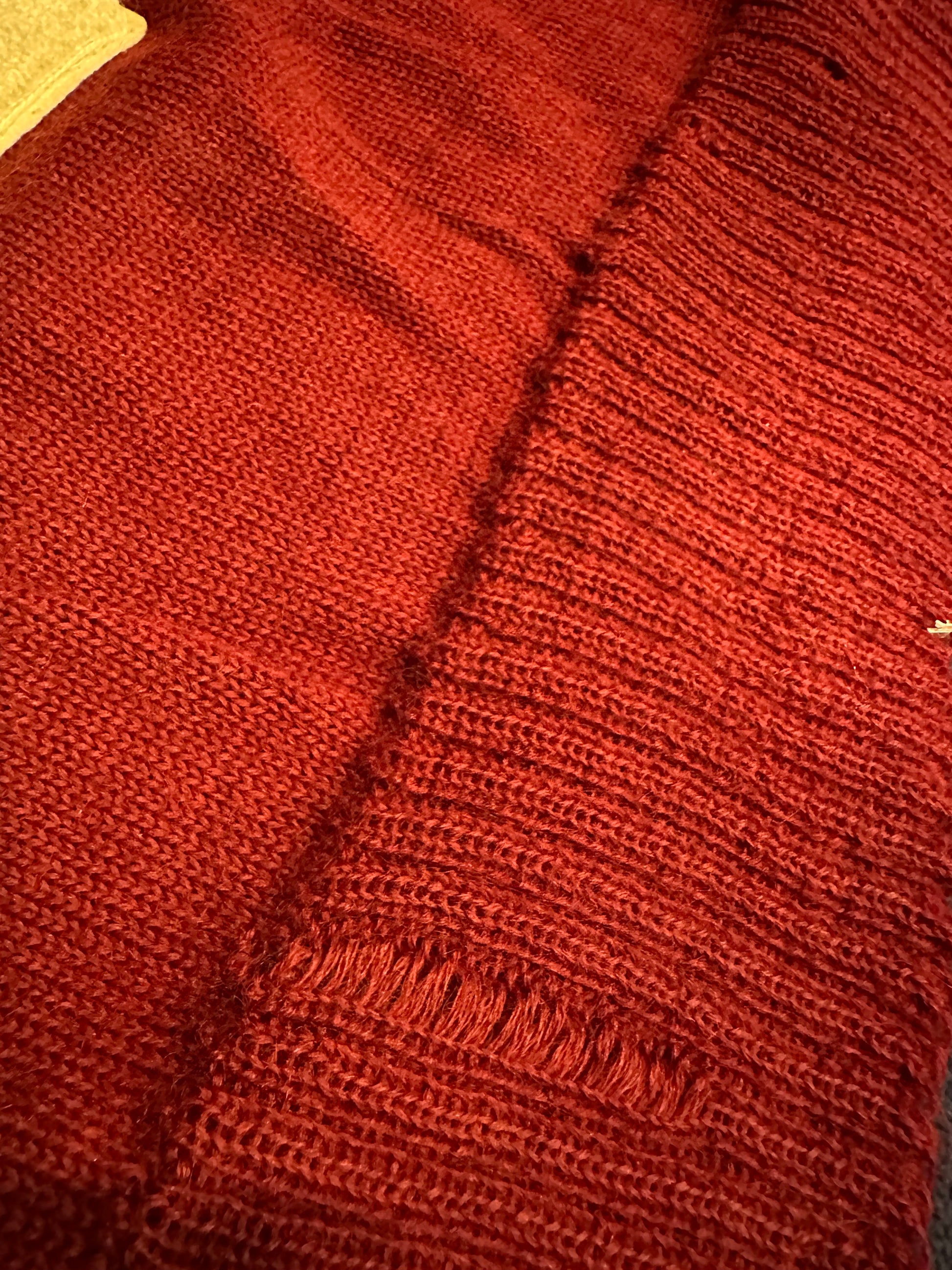 Close up of snag on front of sweater.