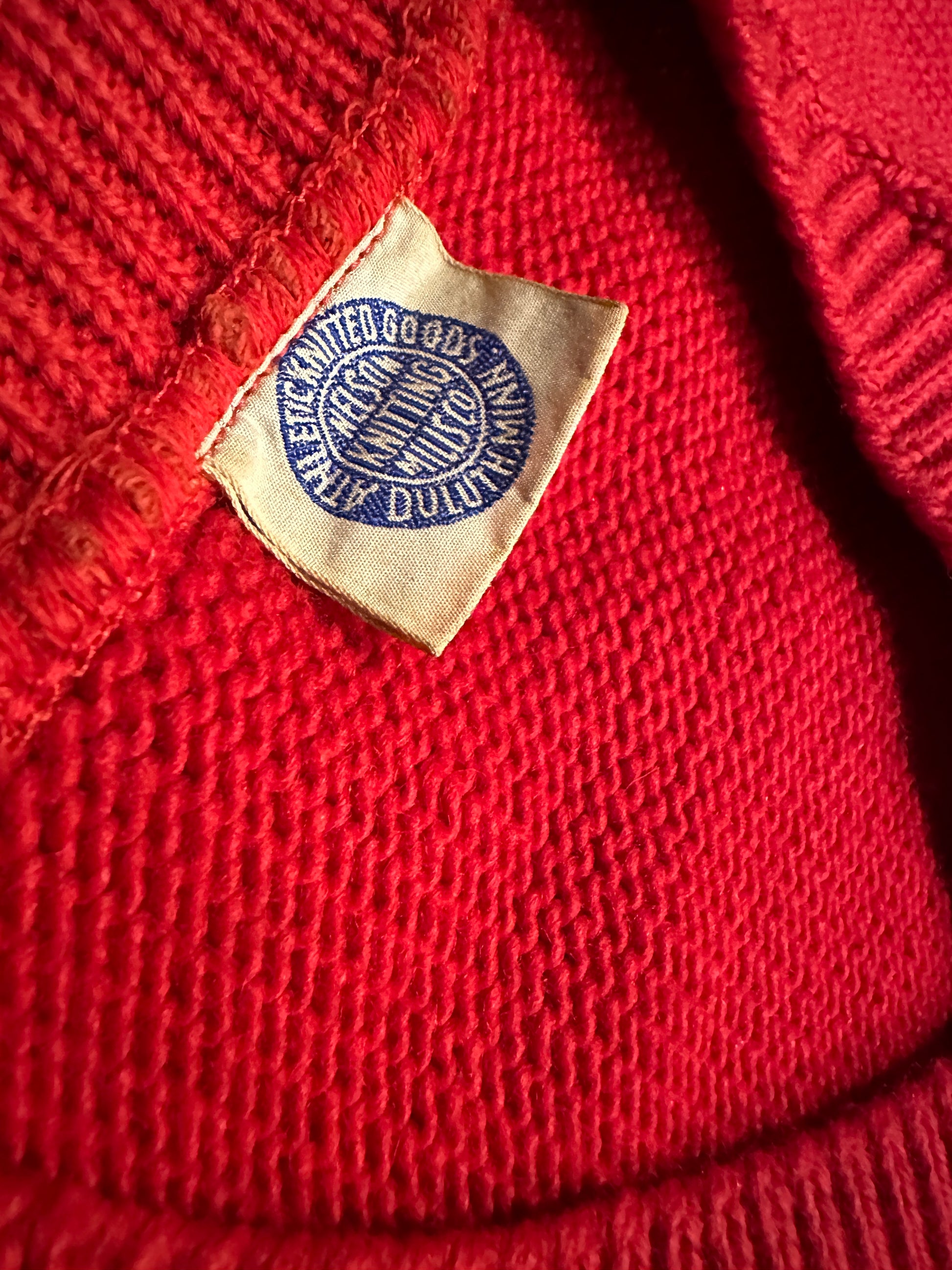 Inner tag of letter sweater.